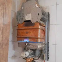 تعمیر آبگرمکن پکیج بخاری برق کشی اسید شویی