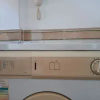 در حد نو|ماشین لباسشویی و خشککن لباس|صحنه, |دیوار