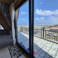 کلبه سوئیسی تک خواب با جکوزی۲نفره تراس دارلب ساحل|اجارهٔ کوتاه‌مدت ویلا و باغ|بندر انزلی, اطبا|دیوار