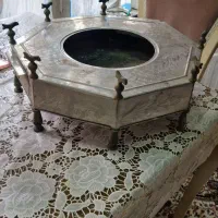 سینی استیل قدیمی زیر کرسی