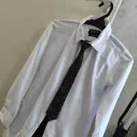 یک عدد کت و شلوار پسرانه کلا یک بار پوشیده