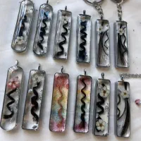 گردبند رزینی مو یار (جاکلیدی پلاک موتور و ماشین)