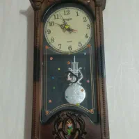 ساعت دیواری طرح چوب تمیز بدون هیچ ایرادی