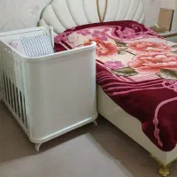 تخت گهواره کنار مادر نوازدی تا ۳ سال