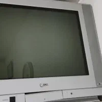 زیر تلوزیون و تلویزیون و فرش و دستگاه دیجی تال