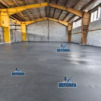 کفسازی صنعتی سوله بتن ریزی با ماله پروانه ای
