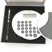 ماشین حساب و جا پد موس کامپیوتر