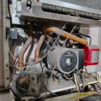 سرویس انواع پکیج های ایرانی وخارجی|آبگرمکن، پکیج، شوفاژ|زرند, |دیوار