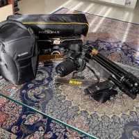 دوربین نیکون Nikon D7100 با لنز 18-140mm و‌سه پایه|دوربین عکاسی و فیلم‌برداری|تهران, امامت|دیوار
