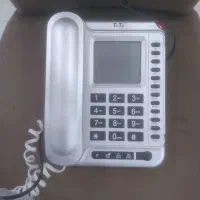 یک عدد گوشی تلفن ثابت رنک طوسی قیمت ۵۵۰ تومن