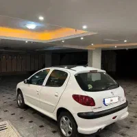 پژو ۲۰۶ تیپ ۳ مدل ۱۴۰۲ سقف شیشه تک برگ سند|خودرو سواری و وانت|تهران, شهرک فردوس (حسینی)|دیوار