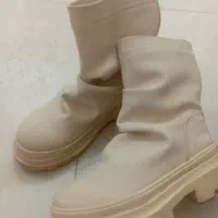 دوجفت پوتین|کیف، کفش، کمربند|رشت, بازار|دیوار