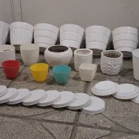 گلدان سنگی بزرگ نو گلدانهای زیاد زیر گلدونی