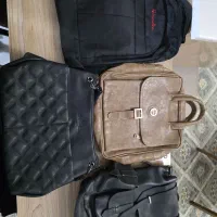 ساعت و کیف بیرونی