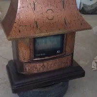 بخاری کوچک اتاق و شومینه بزرگ