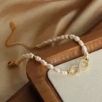 دستبند بینهایت مروارید پرورشی و تیتانیوم|بدلیجات|تهران, اقدسیه|دیوار