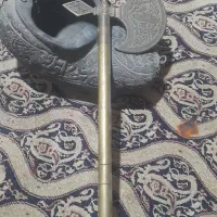 کشکول وتبرزین