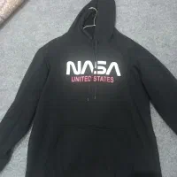 کاپشن|لباس|مشهد, موعود|دیوار