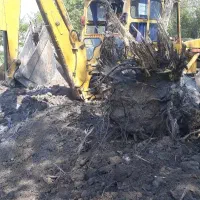 خدمات بیل بکهو درآوردن ریشه