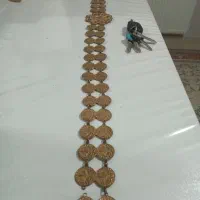 کمربند ظاهرا طلای شاید نقره باشه