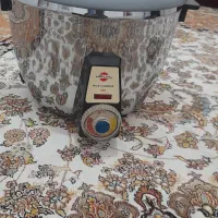 پلوپز برقی و قابلمه تفلون