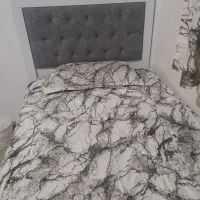 تخت یک نفره همراه با خوشخواب و کفی