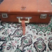 یک عددچمدان مسافرتی