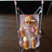 عروسک کالسکه دار