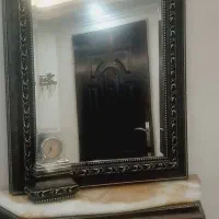 اینه و شمعدون