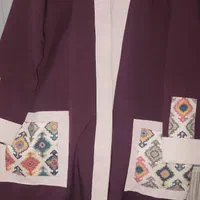 تعدادی مانتو در سایزهای مختلف