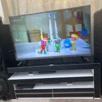 ال ای دی ۴۷ اینج الجی با میز دو رو