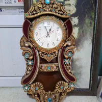 فروش یک ساعت خانگی و یک مایکروفر