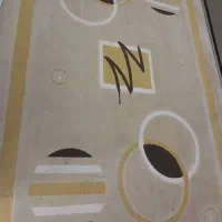 فرش ماشینی دستباف قالی  در حد نو  کرم