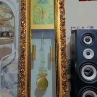 ساعت ایستاده و جاکفشی طلایی