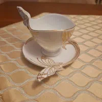 یک دست فنجان چای خوری چینی و قندان