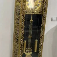 ساعت ایستاده برنجی برنزی این شکلی