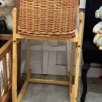 گهواره حصیری با پایه چوبی