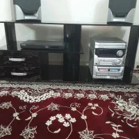 میز زیر تلویزیونی شیشه ای و تخت دونفره چوبی باتشک|میز تلویزیون|نهاوند, |دیوار