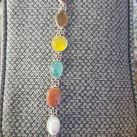 دستبند نقره با نگین های سنگ مخصوص