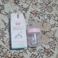 شیشه شیر آک