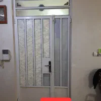 درب آهنی دولنگه باچهارچوب