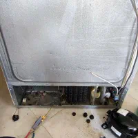 تعمیر تخصصی یخچال فریزر در محل با ابزار دیجیتال