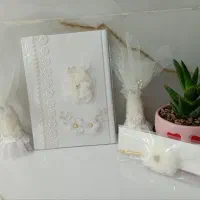 دفتر بله برون و استند حلقه عروس