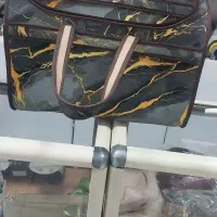 ساک مسافرتی و کیف قابلمه