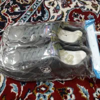 کفش اصلی ترک|کیف، کفش، کمربند|قم, قلعه عموحسین|دیوار