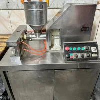 دستگاه کباب زن اتوماتیک اکفا. سیخ گیر