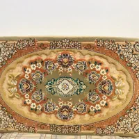 پشتی و قالیچه