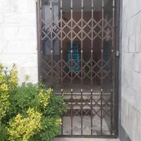 نصب درب حفاظ اکاردئونی ورودی ساختمان