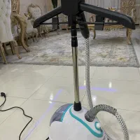 یک‌عدد اتو‌ بخار استاده