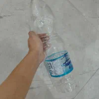 بطری ۱/۵ دانه ای ۲۰۰۰ و قوطی کنسرو.شیشه نوشابه